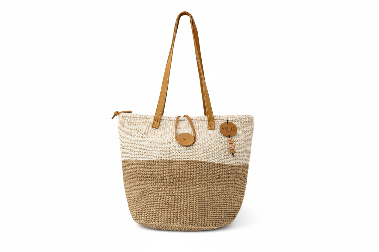 Handwoven two-tone sisal tote bag with leather handles handmade by women artisans in Kenya by Asiliz.