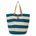 Handwoven blue and white sisal tote bag with leather handles handmade by women artisans in Kenya by Asiliz.